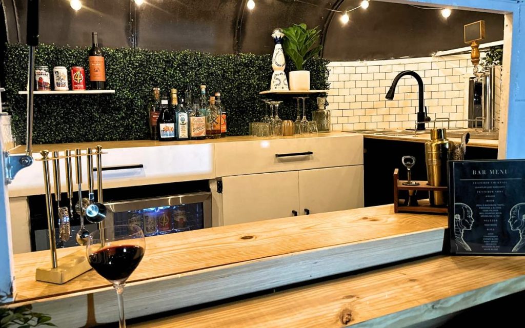 Mobile bar at an event in Austin, TX. The signature drink menu is presented for bar service.